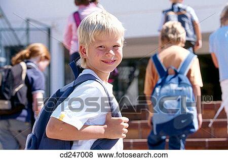 Stock Photo - backpack, blond, boy, child. Fotosearch