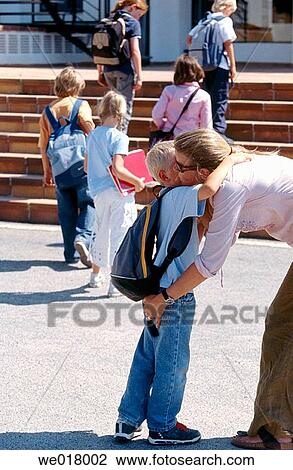 Stock Image - backpack, boy, bonding, bond, affection. Fotosearch