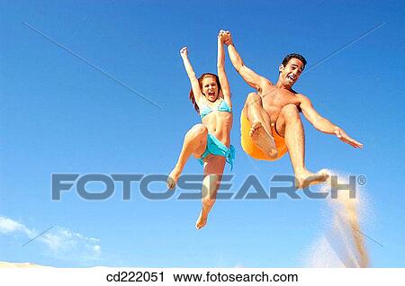 bathing-suit, blue sky, blue, beach, amusement View Large Photo Image Stock Image - bathing-suit, blue sky, blue, beach, amusement. Fotosearch