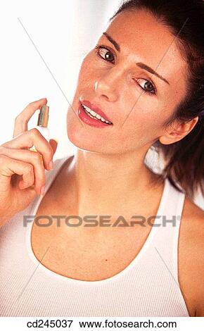 Stock Photo - beauty, brunette, Beauty Care, aroma. Fotosearch