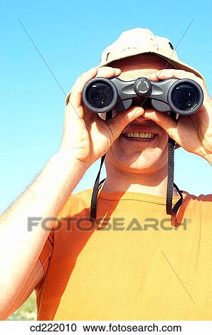binocular, blue, blue sky, cap View Large Photo Image Stock Image - binocular, blue, blue sky, cap. Fotosearch