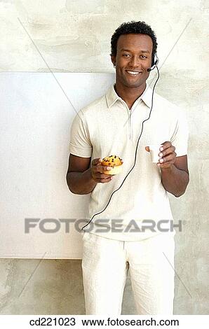 Stock Image - Black man having break. Fotosearch