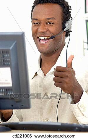 Black man, telemarketing, happy View Large Photo Image Stock Photograph - Black man, telemarketing, happy. Fotosearch