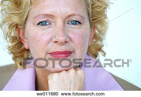 Stock Image - blond, blue eyes, business, businesspeople, businesswoman. Fotosearch