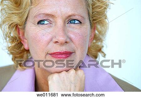 Stock Image - blond, blue eyes, business, businesspeople, businesswoman. Fotosearch