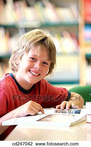 Stock Image - blond, book, boy, child, childhood. Fotosearch