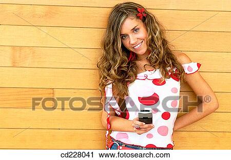 blond, cell phone, adolescence View Large Photo Image Stock Image - blond, cell phone, adolescence. Fotosearch