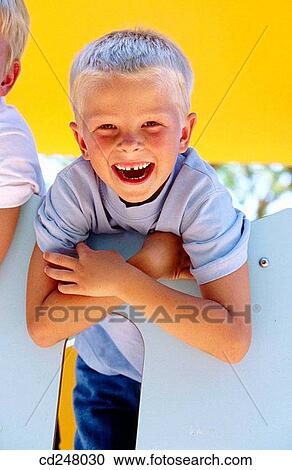 Stock Image - blond, childhood, child, boy, amusement. Fotosearch