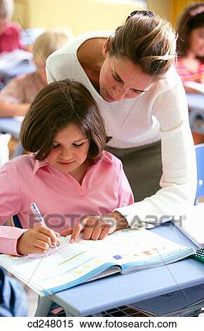 Stock Photography - book, boy, child, classroom. Fotosearch