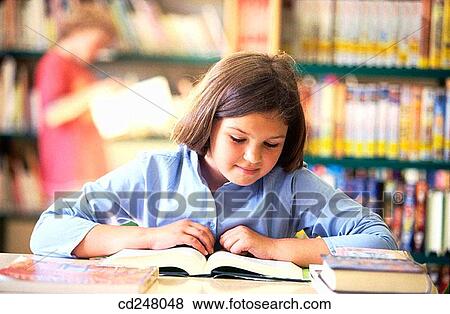 Stock Photo - book, brunette, child, childhood. Fotosearch