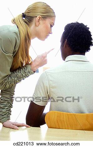 Boss reprimanding employee View Large Photo Image Stock Image - Boss reprimanding employee. Fotosearch