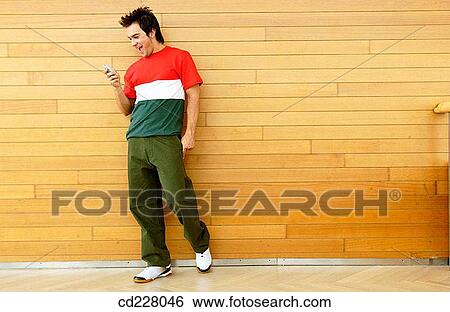boy, cell phone, amusement View Large Photo Image Stock Photograph - boy, cell phone, amusement. Fotosearch