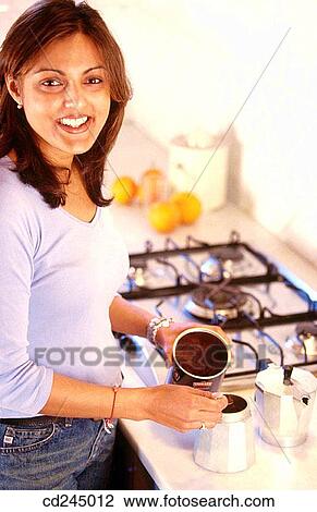 brunette, coffee-maker, coffee, at-home View Large Photo Image Stock Image - brunette, coffee-maker, coffee, at-home. Fotosearch