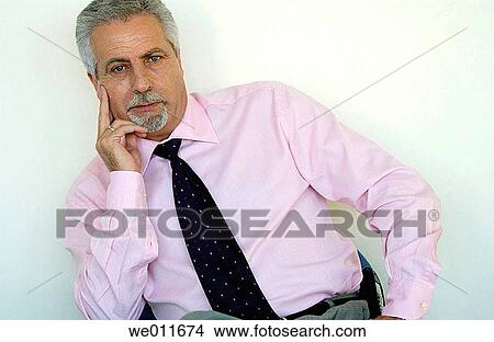 Picture - business, businessman, businesspeople, chair. Fotosearch
