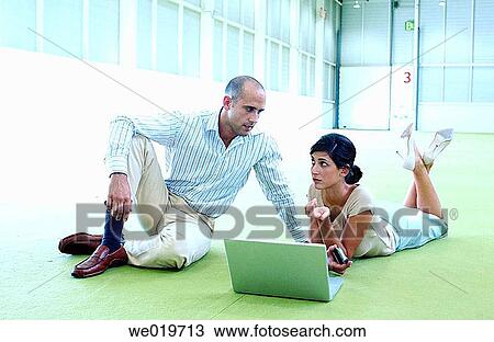 Stock Image - business, businesspeople, businessman, 30's. Fotosearch