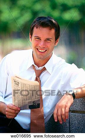 Stock Photography - Businessman with newspaper. Fotosearch