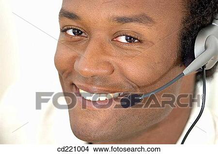 Close-up black man, Telemarketing View Large Photo Image Picture - Close-up black man, Telemarketing. Fotosearch
