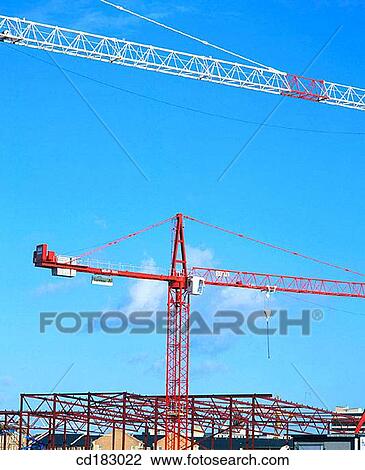 Construction cranes View Large Photo Image Stock Image - Construction cranes. Fotosearch