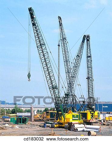 Construction cranes View Large Photo Image Stock Image - Construction cranes. Fotosearch