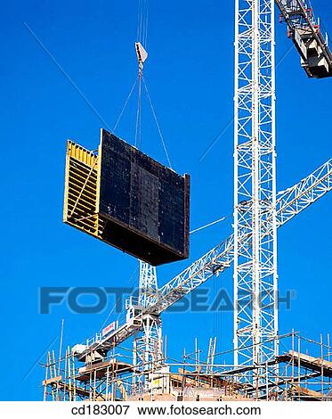 Construction cranes View Large Photo Image Stock Photo - Construction cranes. Fotosearch