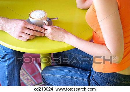 Couple drinking coffee (details) View Large Photo Image Picture - Couple drinking coffee (details). Fotosearch