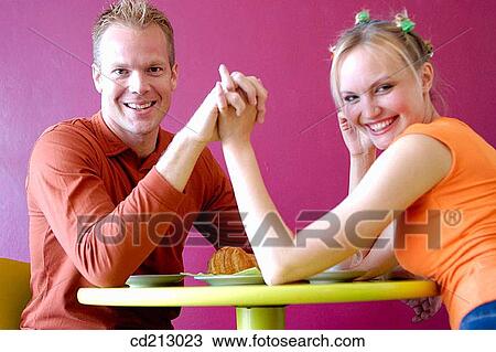 Couple having breakfast in a cafe View Large Photo Image Stock Image - Couple having breakfast in a cafe. Fotosearch