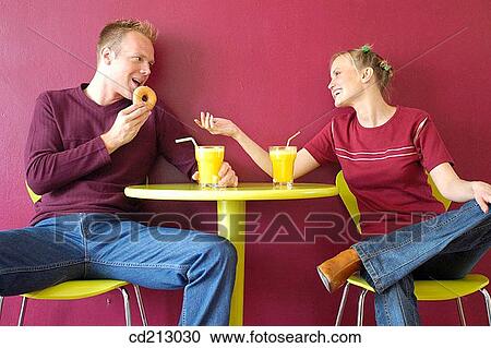 Couple having breakfast View Large Photo Image Stock Image - Couple having breakfast. Fotosearch