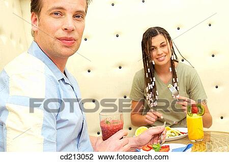 Couple having breakfast View Large Photo Image Stock Image - Couple having breakfast. Fotosearch