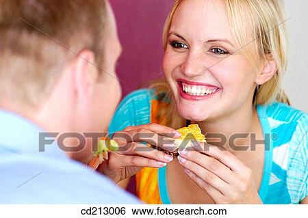 Couple having breakfast View Large Photo Image Stock Photograph - Couple having breakfast. Fotosearch