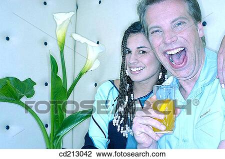 Couple having fun View Large Photo Image Stock Image - Couple having fun. Fotosearch