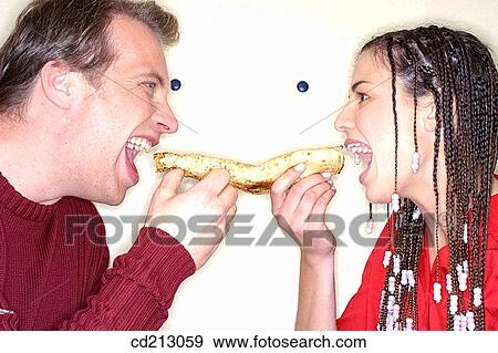 Couple sharing crepe View Large Photo Image Stock Photo - Couple sharing crepe. Fotosearch