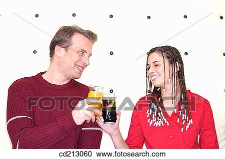 Couple toasting View Large Photo Image Stock Image - Couple toasting. Fotosearch