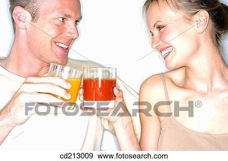Couple toasting View Large Photo Image Stock Photo - Couple toasting. Fotosearch