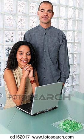 Stock Photo - Coworkers. Fotosearch