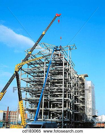 Cranes and flats under construction View Large Photo Image Stock Photography - Cranes and flats under construction. Fotosearch
