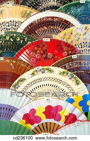 Stock Image - Fans display in shop window. Spain. Fotosearch
