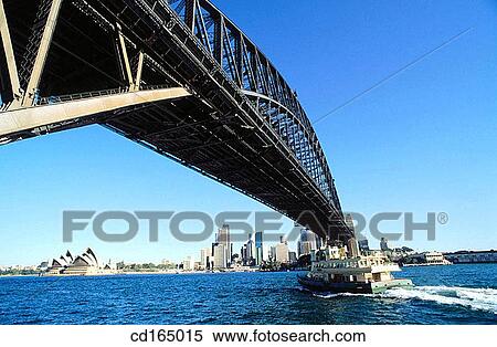 Ferry passing under Harbour Bridge. Sydney. Australia View Large Photo Image Stock Photography - Ferry passing under Harbour Bridge. Sydney. Australia. Fotosearch