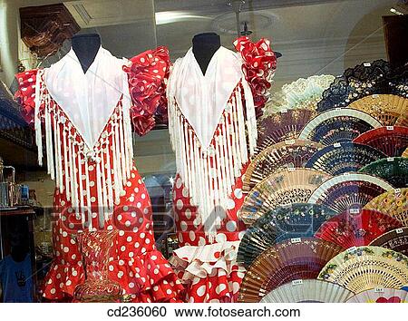 Flamenco dresses and fan display in shop window. Andalusia, Spain View Large Photo Image Stock Image - Flamenco dresses and fan display in shop window. Andalusia, Spain. Fotosearch