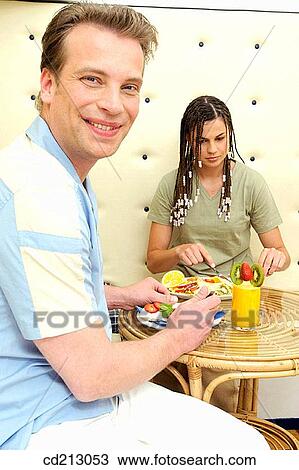 Friends having breakfast View Large Photo Image Stock Image - Friends having breakfast. Fotosearch