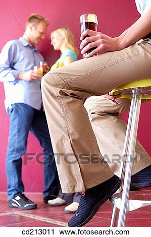 Friends socializing View Large Photo Image Stock Image - Friends socializing. Fotosearch