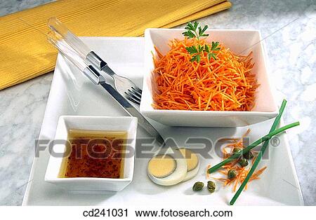 Stock Image - Grated carrot. Fotosearch