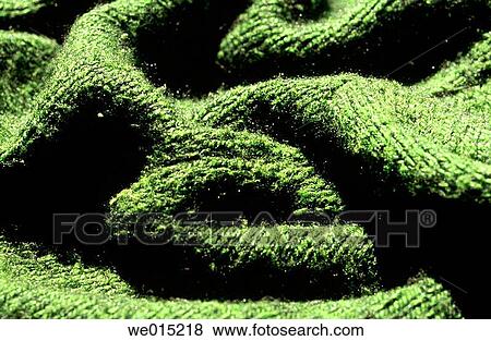 Greenish wavy shapes on textile. View Large Photo Image Stock Photo - Greenish wavy shapes on textile.. Fotosearch