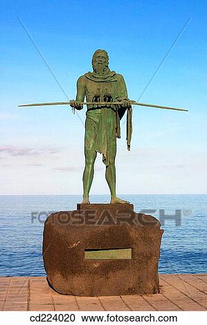 Stock Image - Guanche statue. Candelaria. Tenerife. Canary Islands. Spain. Fotosearch