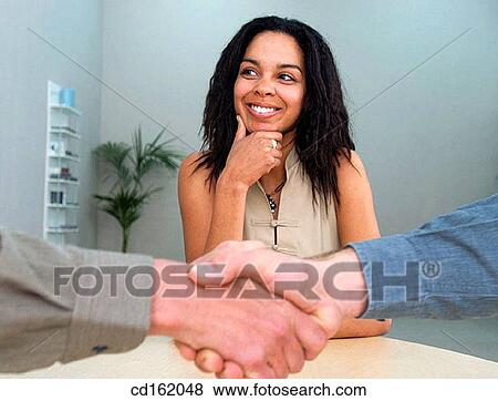 Stock Photo - Handshaking. Fotosearch
