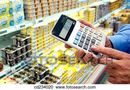 Hypermarket, calculating prices View Large Photo Image Stock Image - Hypermarket, calculating prices. Fotosearch