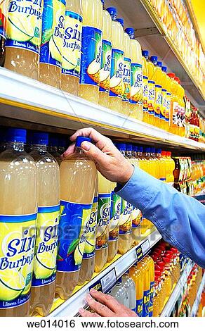 Hypermarket, juice bottles View Large Photo Image Stock Photograph - Hypermarket, juice bottles. Fotosearch