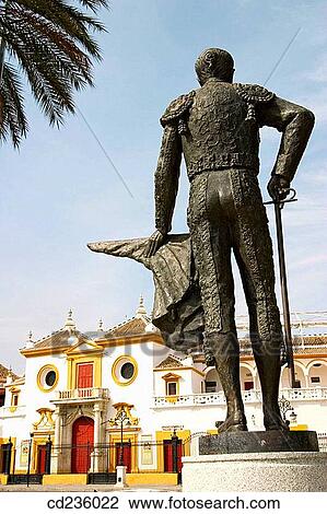 Stock Image - La Maestranza bullring and statue of Pepe Luis Vßzquez. Seville. Andalusia, Spain. Fotosearch