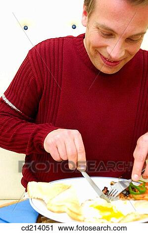 Man having lunch View Large Photo Image Stock Image - Man having lunch. Fotosearch