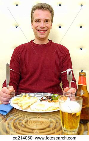 Man, lunchtime, food View Large Photo Image Stock Image - Man, lunchtime, food. Fotosearch