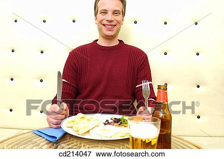 Man, lunchtime View Large Photo Image Stock Photo - Man, lunchtime. Fotosearch